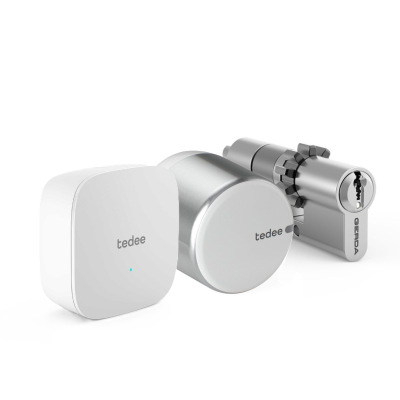 Zestaw inteligentny zamek Tedee Lock GO2 (aluminium) srebrny z białym przyciskiem + Tedee Bridge Wi-Fi + wkładka modułowa SLR 30-61/30 mm z zębatką (typ B)